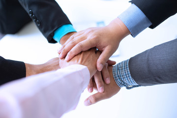 Obraz premium Power of cooperation in the construction business.To succeed in developing sustainable partnerships.