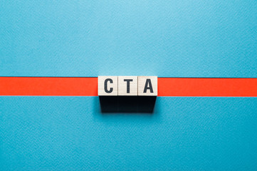 CTA - Call to action word concept on cubes