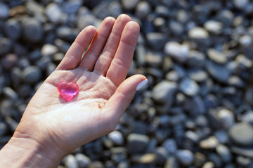hand holding stones