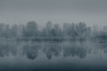 Mysterious fog on the river. Web banner.