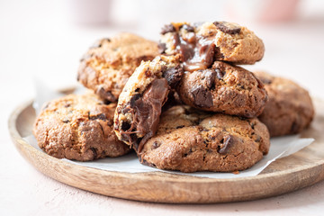 chocolate chunk cookies stuffed with melted caramel