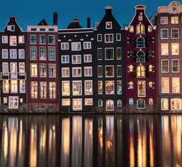 Buildings in Amsterdam Damrak at night