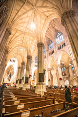 Fototapeta premium New York, United States »; January 5, 2020: Interior seats in the St. Patrick's Neogothic Cathedral in New York style