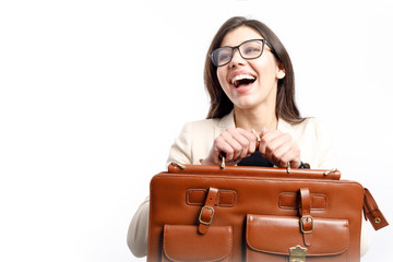 Cute brunette office girl holding a leather satchel and laughing isolated white background copyspace
