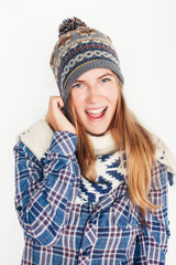 young pretty blond woman in hat and winter scarf smiling cheerful on white background, lifestyle people concept