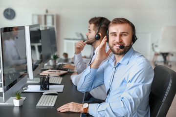 Technical support agents working in office