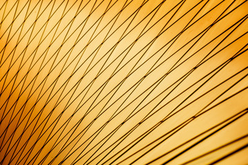 Horizontal photo of beautiful abstract gold metal background with light and shadows. Free space for design.