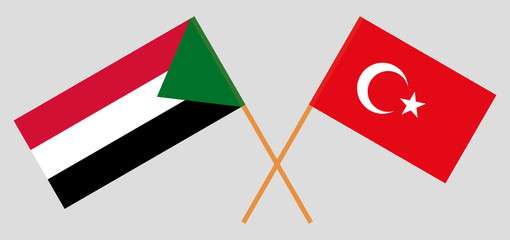 Crossed flags of Sudan and Turkey