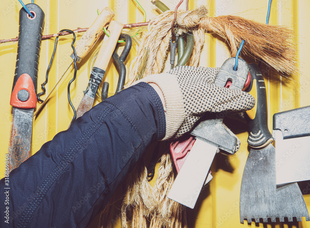 Poster a set of tools on a yellow wall. concept of work in a home workshop, doing homework. tools such as t