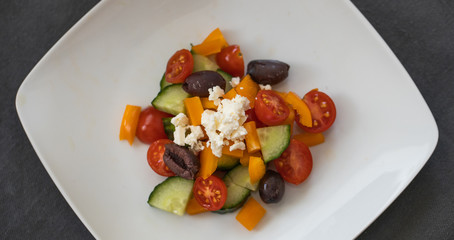 Fresh Greek salad on a white plate