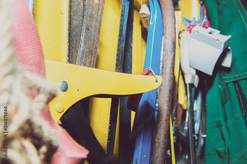 Poster a set of tools on a yellow wall. concept of work in a home workshop, doing homework. tools such as t