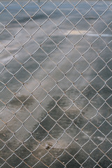 snowy mesh fence