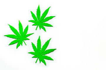 Naklejka na ściany i meble Green leaf of cannabis. Cannabis medical products isolated on white. CBD. Medical marijuana concept.