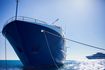 A bow of blue yacht in the sea. Tourism and travel concept