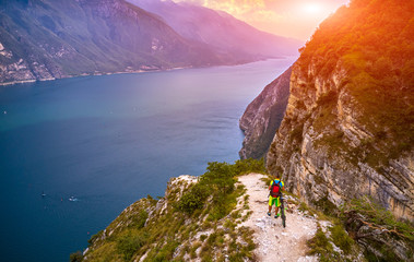 Panoramic view of the beautiful Lake Garda and Riva del Garda town in the summer time , Trentino...