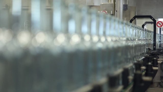Wine bottles in conveyor belt  bottling line industry