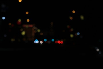 abstract defocused cars and street lights at night