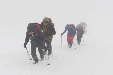 Climbing in a bad weather in winter