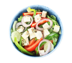 Bowl of tasty Greek salad on white background