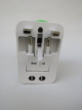 Travel Adaptor Adapter Universal EU AU UK US Plug with Port USB worldwide all in one isolated on white background for travelling equipment with casing and pouch. 
