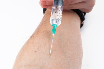 Taking a blood sample from a patient. Copy space.