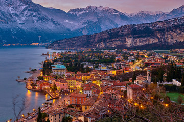 Christmas lights adorning the city center and Riva del Garda Street, View of the beautiful Riva del Garda town by night,Italy