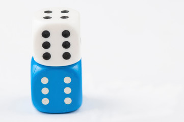Blue and white dices for board games isolated on the white background. Copy space.