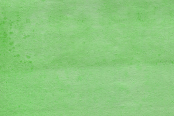 Cardboard green abstract pattern texture close-up. Retro old paper background. Grunge concrete wall. Vintage blank wallpaper.