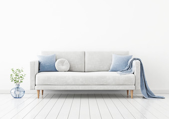 Living room interior wall mockup with gray velvet sofa, blue pillows, plaid and green plant branch in vase on empty white wall background. 3D rendering, illustration.