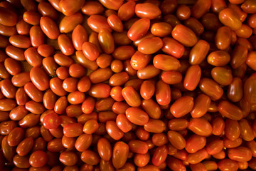 background of small tomatos