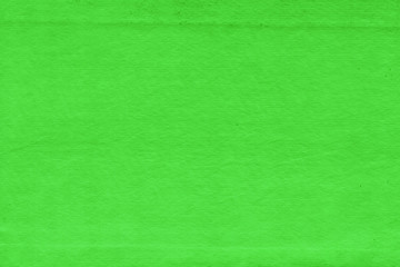 Fototapeta premium Cardboard green abstract pattern texture close-up. Retro old paper background. Grunge concrete wall. Vintage blank wallpaper.