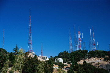 Obraz premium TV/radio antennas on hill
