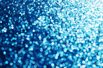 Party festive happy glitter texture. Blue bokeh shiny background. Abstract vibrant color glowing white spots texture for graphic design. Magic colorful backdrop.