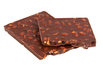 milk chocolate with nuts and berries brocken isolated on the white