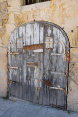 vintage wooden door in old building in the city Valetta on the island of Malta