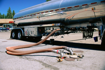 Gas truck filling underground tank