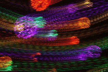 colorful lights background, motion blur, long shutter speed, rays of lights