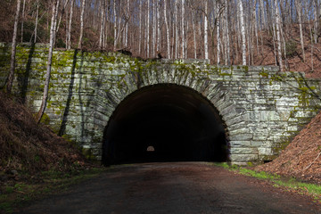 Road leading into a tunnel