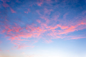 Dramatic blue sky with red clouds. Nature background