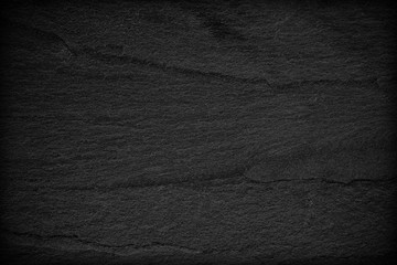 Dark grey black slate background or texture.