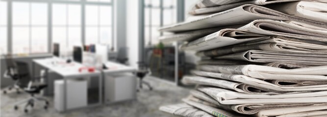 Pile of newspapers stack on background