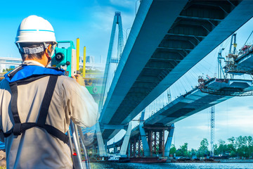 The use of the theodolite to control of sophisticated construction works. A man with a theodolite...