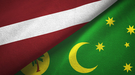 Latvia and Cocos Keeling Islands two flags textile cloth, fabric texture