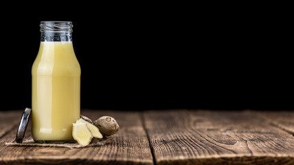 Portion of Ginger Juice as detailed close-up shot; selective focus