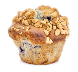 Some Blueberry Muffins isolated on white (selective focus)