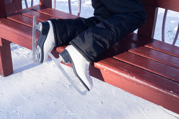 Skates on the feet of a child. Winter.