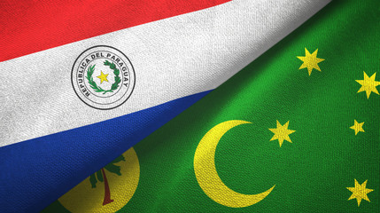 Paraguay and Cocos Keeling Islands two flags textile cloth, fabric texture
