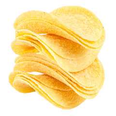 Yellow slices of potato chips with sour cream and onions isolated on white background close-up