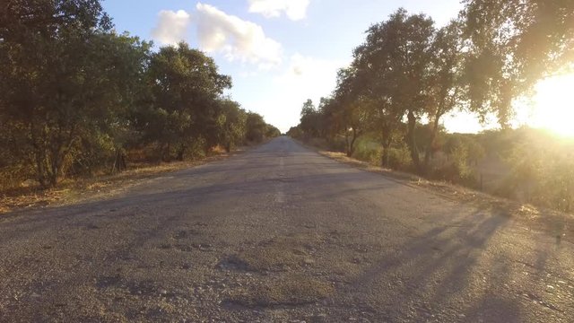 empty rural road at sunset in Alentejo portugal steady shot