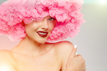 Woman Big Hat and Lips. Model wearing Fabric with lace ruffles hat. High Fashion Model fabric crown...